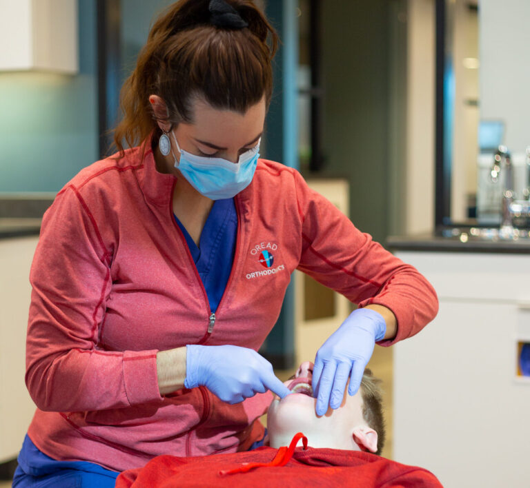 Staff member with a patient